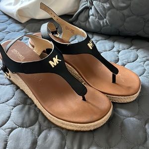 Michael Kors black Sandals in a size 7.5. Worn one time.